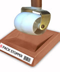Universal Bed Wheel Stopper Set Six Pack For Furniture Casters, Rubber Caster Cups, shown installed under wheel on beige floor pad