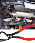 Exhaust hanger removal tool with red-handled pliers for rubber hangers, installed under a car's exhaust system