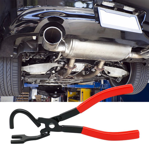 Exhaust hanger removal tool with red-handled pliers for rubber hangers, installed under a car's exhaust system