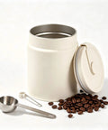 Premium Airtight Coffee Canister Built From Rock Solid Stainless Steel Keeps Your Daily Grind Super Fresh With Tight Silicone Seal Includes Bonus Scoop And Freshness Clip For Kitchen Counter with coffee beans