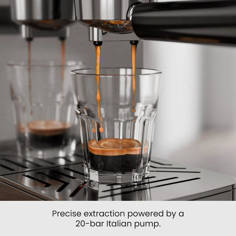 Close-up of espresso extraction from Quick Heat 20 Bar Espresso Machine With Integrated Milk Frother For Silky Lattes And Cappuccinos Boasting Rapid Boiler And Spacious Removable Tank Designed For Reliable Daily Grind Sessions And Consistent Home Barista Pulls Stainless Finish.