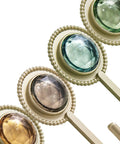 Slick Four Pack Adhesive Wall Hooks For Hanging Towels And Robes With Knockout Grip No Drilling Required Super Quick Mount For Bathroom Kitchen Or Entryway Storage, featuring decorative orb designs.