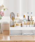 White Acrylic Makeup Organizer With Drawers For Vanity And Bathroom Counter Holds Your Glam Haul Secure Plus Multi Compartment Cosmetic Storage For Skincare And Daily Essentials with various skincare products and tools.