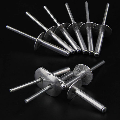 50 Pack Heavy Duty Large Flange Aluminum Blind Rivets 1 8 By 5 16 Inch Solid Steel Mandrel Rust Resistant Pop Fasteners No Sweat Install For Automotive And Home Repairs Silver close-up view on black background.