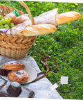 Picnic scene with Six Pieces Gold Rectangle Tablecloth Weights Clips For Outdoor Tables securing tablecloth in place