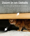No Sweat Setup 4Mp Indoor Security Camera With Solid Hd Video And Clear Two Way Audio Free Ai Motion Tracking Night Vision Plus Easy Phone App Control For Your Pooch Around The Clock capturing a cat under furniture.