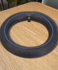 Inflatable inner tube for Off Road Electric Scooter Tire 8.5x2 with 50/75-6.1, shown on wooden surface