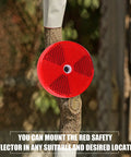 Close-up of red round reflector mounted on tree, 16 Pack Red Round Reflectors For Driveways Fences Gates Trailers Cars Boats and Mailboxes With Center Mount Holes For Easy Screw Mounting And No Brainer Install With High Night Visibility
