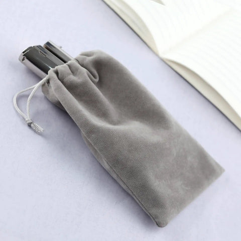 Heavy Duty Handheld Single Hole Punch For Paper Card Plastic PVC And Cardstock Long Reach Pro Grade Hole Puncher in a grey pouch