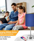 Touch Control Table Lamp Blue Shade Three Way Dimmable Lamp With Two Fast Charging USB Ports And Power Outlet placed on table.