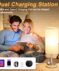 Couple using Touch Table Lamp With USB-C And USB-A Ports, 3-Way Dimmable Bedside Desk Light for charging devices while sitting on sofa