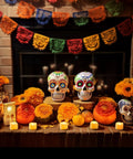 Decorative display with colorful skulls, marigolds, and 24 Pack Flameless LED Tea Lights Candles Battery Operated With Realistic Flicker Warm Glow