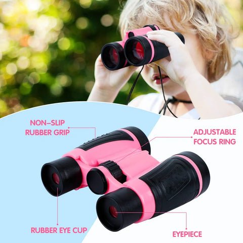 Child using pink binoculars from Girls Outdoor Explorer Kit With Bug Catcher Gear For Backyard Adventures, features non-slip grip