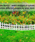 Arched White Garden Edging 33 Feet Long With 60 Plastic Stakes Flexible No Dig Lawn Border in front of colorful flower bed.
