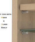 Close-up of Heavy Duty Stainless Steel Shelf Pegs And Pins 5mm And Quarter Inch Dual Diameter One Inch Long Rust Proof Cabinet Support Clips in use with glass shelf.