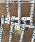 Straight Up Light Duty Gravity Conveyor With Portable Cargo Unloading Slide featuring spliced multi row rollers on a flat surface.