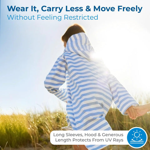 Child wearing Ultra Soft Turkish Cotton Kids Bathrobe And Hooded Towel Poncho With Zip Up, Terry Lining And Pockets on beach