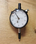 Digital Caliper, Dial Indicator 0-10mm Bore Gauge,for DIY/Household, analog display showing measurement range on wooden surface