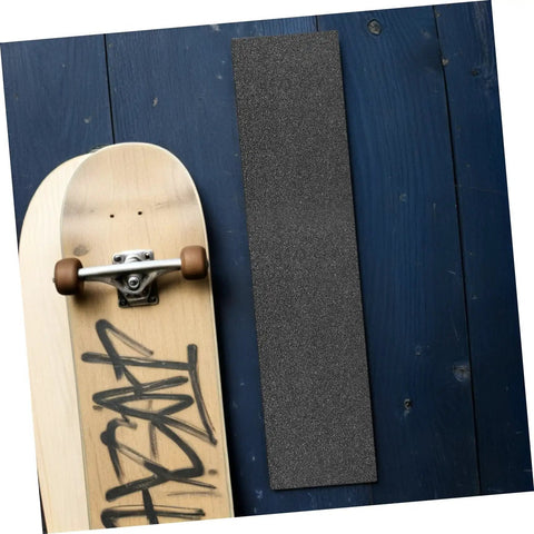 Non Slip Deck Covering For Skateboard And Kick Scooter Waterproof PVC Grip Tape beside skateboard on blue deck