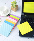 8 Pack Lined Sticky Notes 4x4 Inches Colorful Memo Pads With Super Sticky Adhesive, 8 Bright Colors For Quick Reminders, 54 Sheets Per Pad, Red Pink Orange Yellow Green Light Blue Blue Purple displayed on desk with laptop