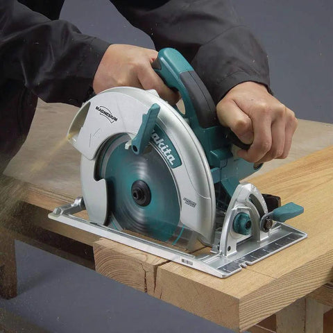 Professional 8 1 4 Inch Magnesium Circular Saw With Electric Brake cutting through wood with sawdust flying.