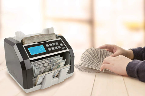 Front Load Bill Counter With Counterfeit Detection, Ultraviolet, Magnetic Ink Verification, and Infrared Sensor on table