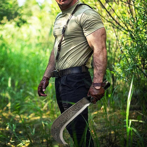 Man holding Heavy Duty Machete Billhook Sickle Knife For Yard Work And Tree Cutting in outdoor setting