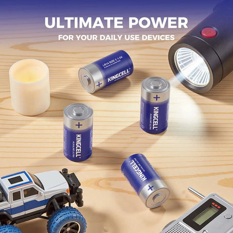 Tough As Nails Size C Alkaline Batteries 8 Pack 1 5 Volt on wooden surface with flashlight and toy truck.