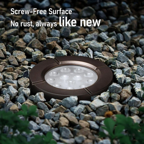 In Ground Well Lights Kit 4 Inch Flat Top, 5 Color Temperature Selectable 1800K 2700K 3500K 4000K 5000K, 12 24V AC DC, CRI90 Low Voltage Landscape Lighting, Oil Rubbed Bronze Aluminum, Pack of 6 installed among rocks