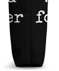 Side view of Work Hard Foil Harder Wing Foil Wingsurfing Tote Bag showcasing black fabric and white text detail.