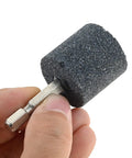 Close-up of one 30mm aluminum oxide grinding stone with 1/4 inch hex shank for electric rotary tools. Ten Piece 30mm Aluminum Oxide Mounted Grinding Stones With One Quarter Inch Hex Shank For Electric Rotary Tools Drill Grinder Built Tough Wear Resistant Bits Great For Metal Wood And Plastic Finishing.