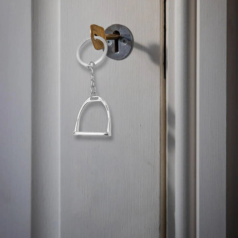 Elegant Stirrups and Snaffle Bit Key Rings D Shaped Keychain, sturdy alloy, hanging on door lock, for equestrians and horse lovers.