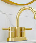 Gold Finish Bathroom Faucet With Dual Handles 360 Degree Rotating Stainless Steel Vanity Lavatory Sink Mixer Lead Free Modern Design Double Handle Commercial Style For Bathroom Sink Easy Operation And Clean Look installed on a white marble countertop