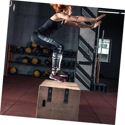 Beefy Rubber Over Center Latch With Concealed Keeper And Flexible Draw Lock attached to a wooden plyo box in a gym setting.