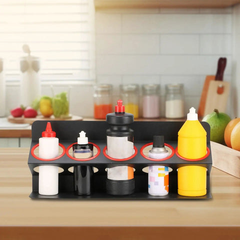 Heavy Duty Iron Wall Mount Spray Bottle Rack For Garage And Shed Storage Holds All Your Bottles Rock Solid And Totally Clutter Free For That Top Shelf Shop Vibe displaying various spray bottles on a countertop.
