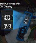 Digital Clamp Meter With U Shaped Jaw for AC DC current voltage, large backlit LCD, in use by technician in electrical panel.