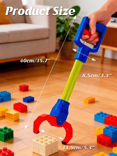 Blue Robot Arm Claw Grabber Toy For Kids 15.7 Inch Flexible Pickup Tool grasping block pieces on the floor.
