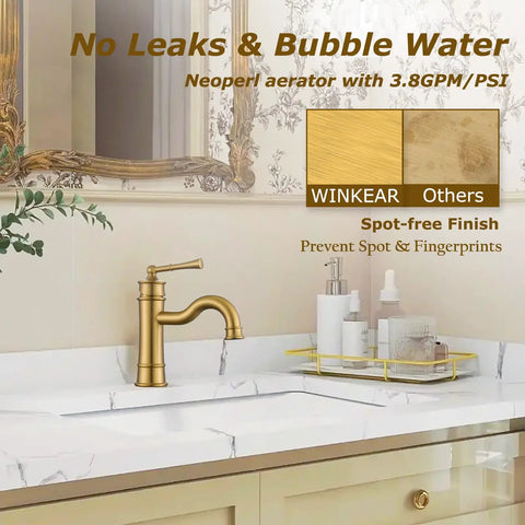 Elegant bathroom with Brushed Gold Bathroom Sink Faucet With Single Hole Deck Mount, Pop Up Drain, and marble countertop.