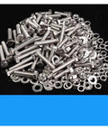 Stainless Steel Hex Head Screws, Nuts, and Washers Set for DIY Enthusiasts Full Hardware Assortment Kit Visible on Black Surface