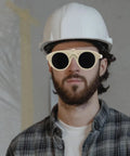 Man in hard hat wearing Rugged As Nails 5 Pack Welding Goggles With Rock Hard Impact Armor And Anti Scratch Lens Plus Snug Dust Shield.