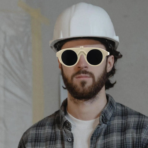 Man in hard hat wearing Rugged As Nails 5 Pack Welding Goggles With Rock Hard Impact Armor And Anti Scratch Lens Plus Snug Dust Shield.