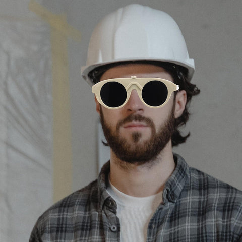 Badass Adjustable Welding Glasses With Anti Scratch Lenses For Safe Industrial Eye Protection For Dudes And Crews Alike worn by man in hard hat.