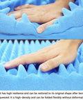 Solid Knockout Acoustic Foam Panels For Sound Proofing Walls And Noise Reduction Recording Studio Egg Crate Tiles showing hands pressing on blue foam