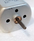 Close-up of 10Mm Flat Shaft Central Door Lock Actuator Motor with D Spindle for Power Lock Repair, OEM Replacement for 12V Door Lock Units