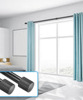 Adjustable Curtain Rod Set 1 Inch Diameter Black Metal For Windows From 16 To 92 Inches Or Up To 104 Inches Max With Cylindrical Finials Six Piece Construction For Easy Assembly In One Pack installed above window with blue curtains.