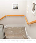 Premium Slick Wooden Stair Handrail Featuring Hella Secure Wall Mount Non Slip Grip For Indoor Outdoor Living Spaces And Senior Support Classic European Style Dope Wood Finish Solid Heavy Duty Build 400Cm Long mounted on indoor stairs.