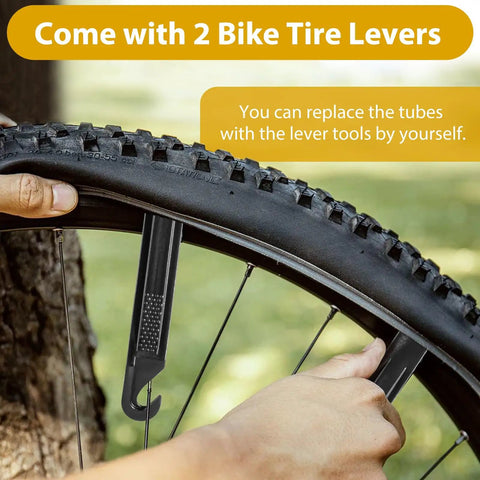 Person using tire lever to change tube on MTB tire, 24 Inch Bike Tube With 32mm Schrader Valve Butyl Inner Tube 2 Pack Fits 24 X 2.125 To 24 X 2.40 MTB Mountain Bike Tires Includes 2 Tire Levers No Fuss For All Mountain Use