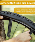 Two Pack 29 Inch Bike Tube With 48mm Presta Valve Fits 29 x 2.125 To 2.4 MTB Tires Butyl Rubber Inner Tube Plus Two Tire Levers Easy Install For Mountain Biking And Trail Riding with a tire lever being used on a bike wheel.