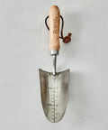 13 Inch Stainless Steel Garden Trowel With Oak Handle And Leather Wrist Strap Built To Last For Digging And Planting Durable Rust Resistant Tool With Long Lasting Performance And 10 Year Warranty