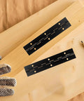 Stainless Steel Piano Hinge Kit Two Pack Six Inch Heavy Duty Continuous Cabinet Hardware displayed on wood with gloves.